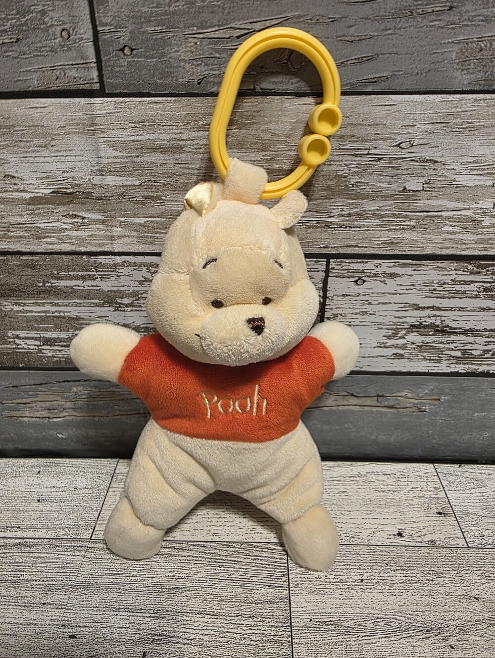 Disney Pooh Plush Clip-On Toy - Yellow Clip, Orange Shirt